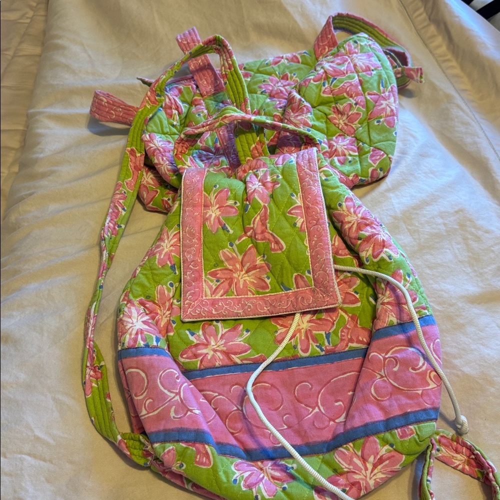 Small bag green with pink flowers and backpack to match.